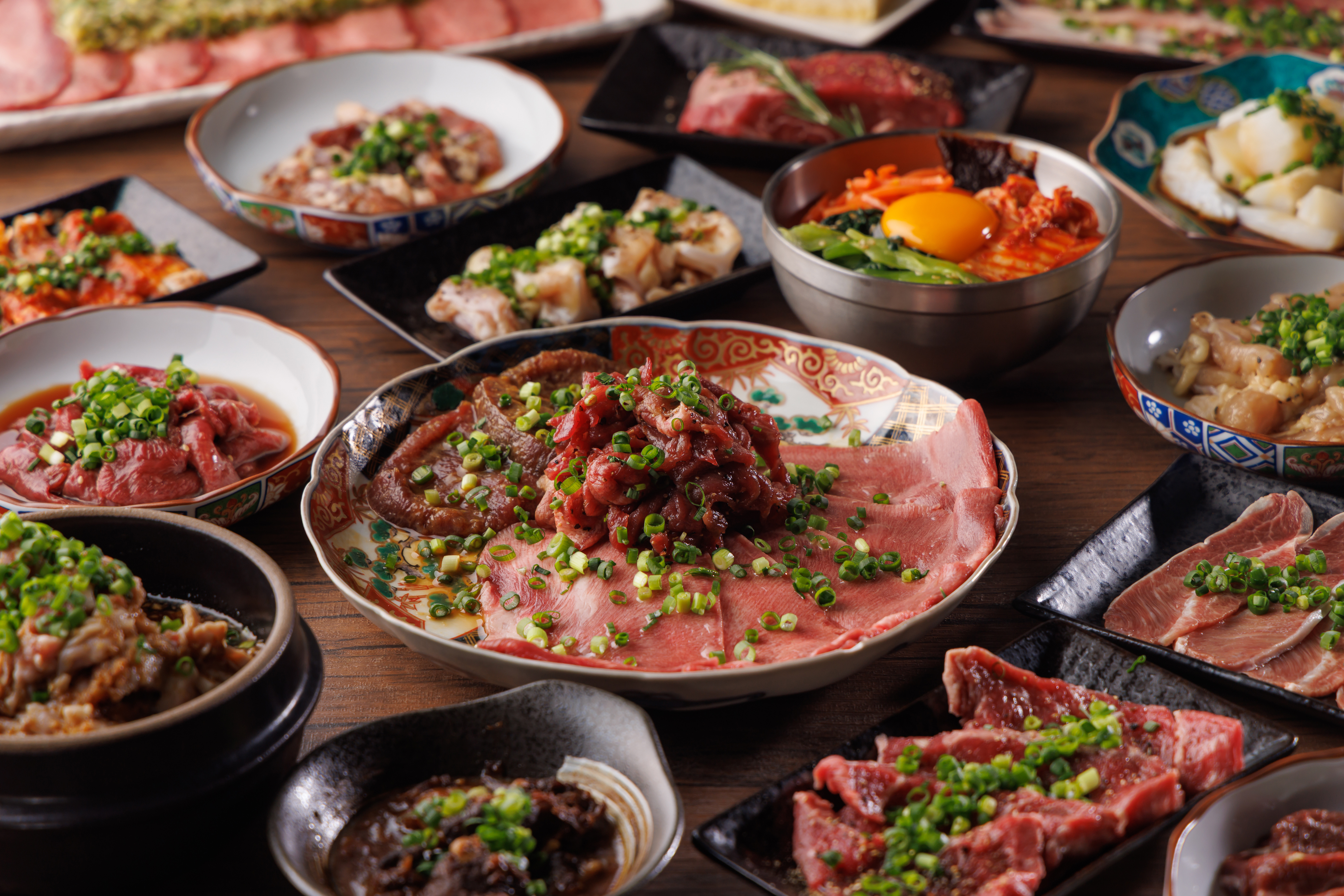 【公式】焼肉 朧 中川店　ネット予約 logo