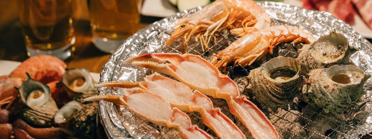 うみのうた【炭火海鮮バイキング】 logo